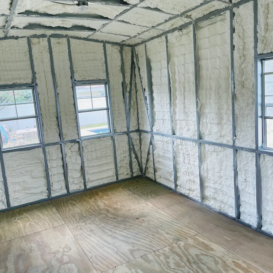 Closed-cell spray foam insulation applied to wall cavities in a residential project in Winter Springs